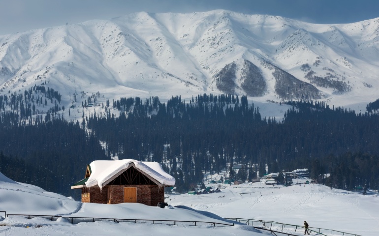 The snow-covered landscape or Gulmarg