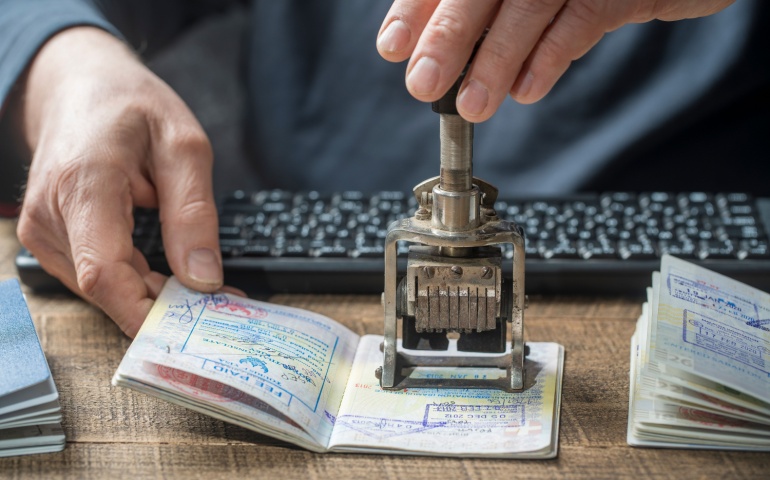 Passport being stamped at the Airport